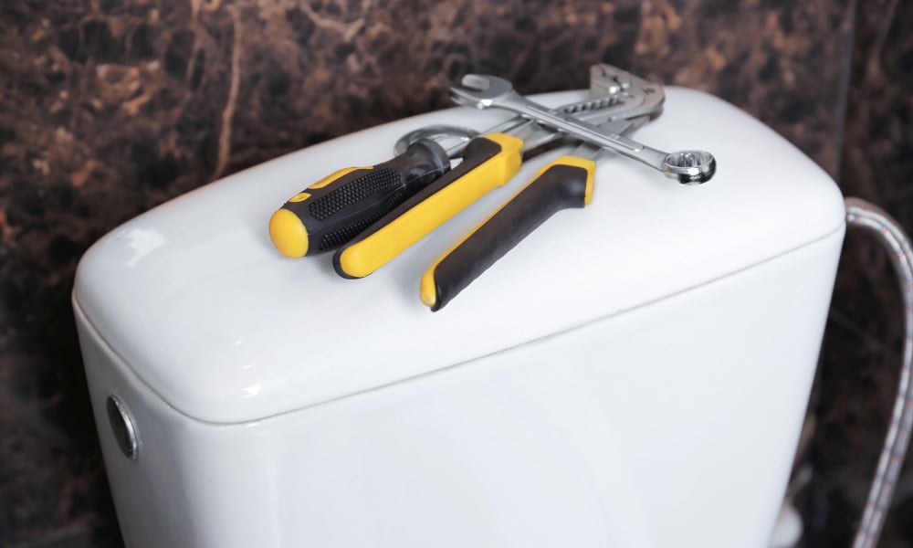 toilet tank with tools