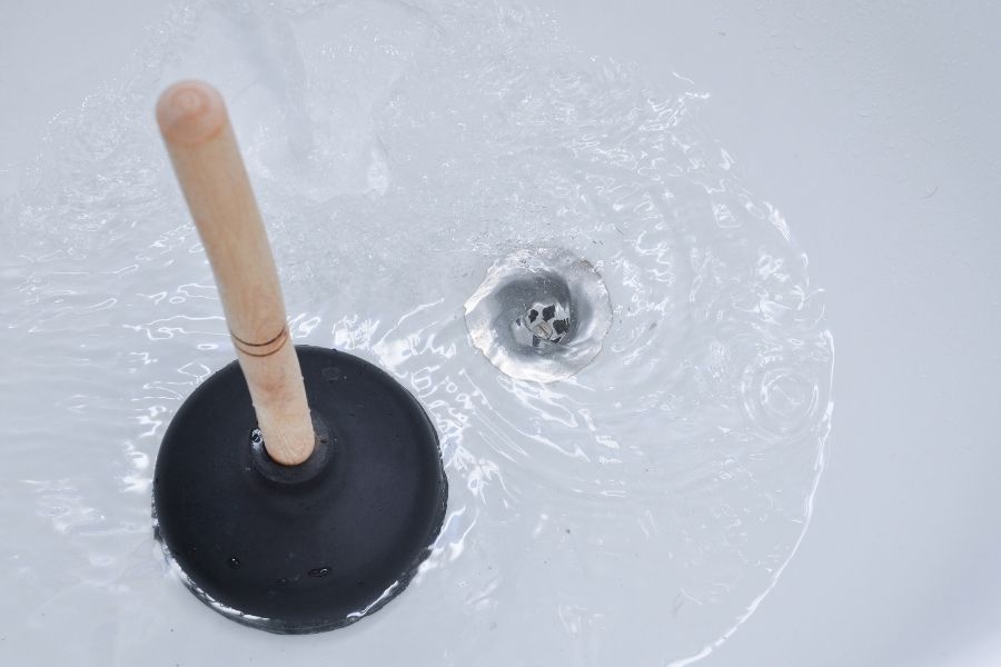 plunger and clogged bath drain