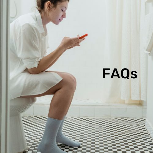 woman sitting on a comfort height toilet